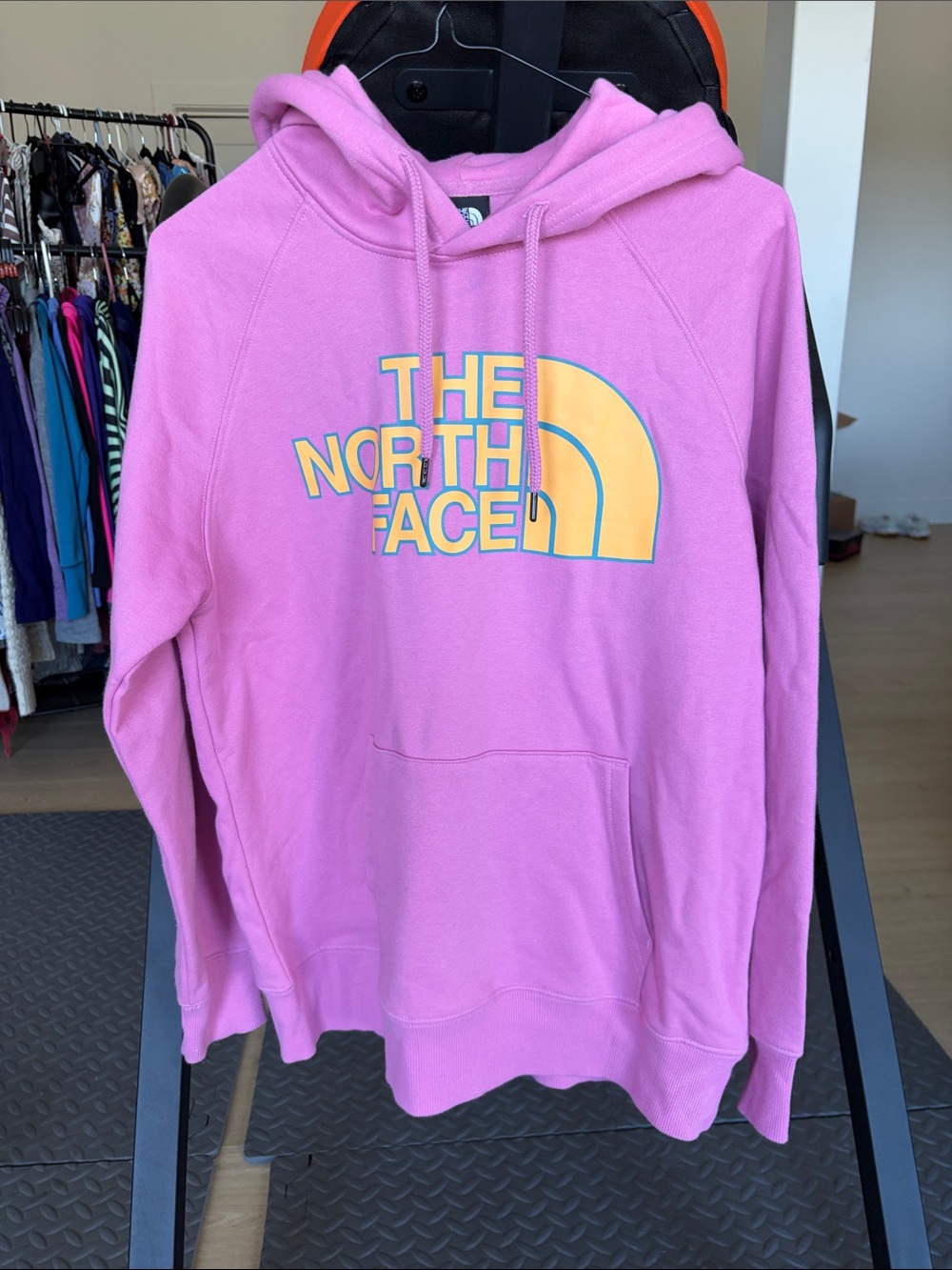 The North Face Pink Pullover Hoodie with Yellow Logo